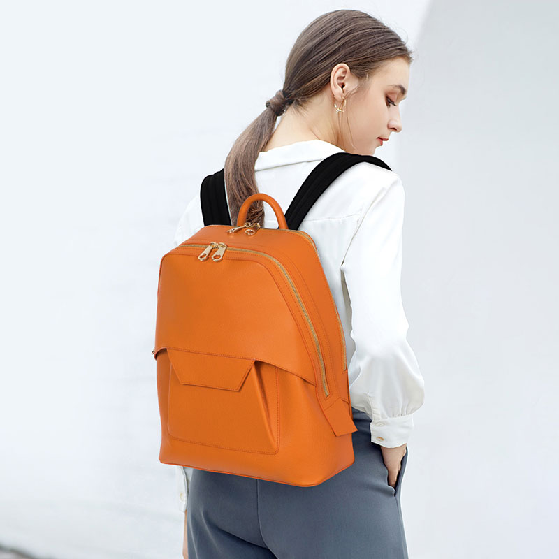 OEM Orange cow leather backpack for ladies with metal logo