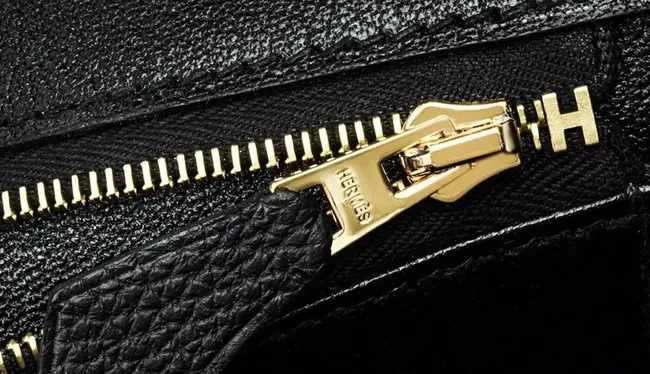 Hermès Birkin bag hardware uses solid brass core material